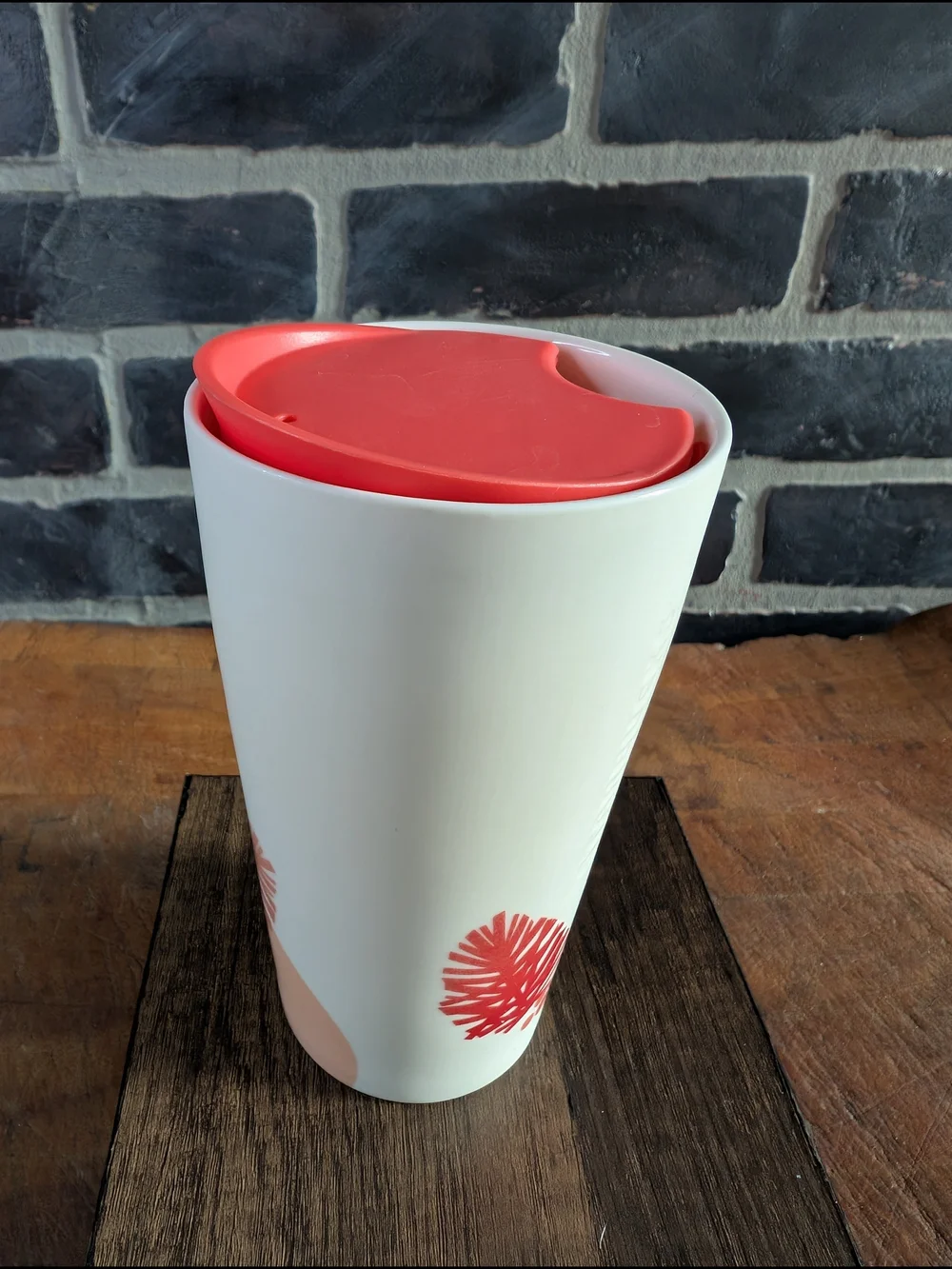 Starbucks White Ceramic Travel Mug with Coral Lid and Pinecone Accent